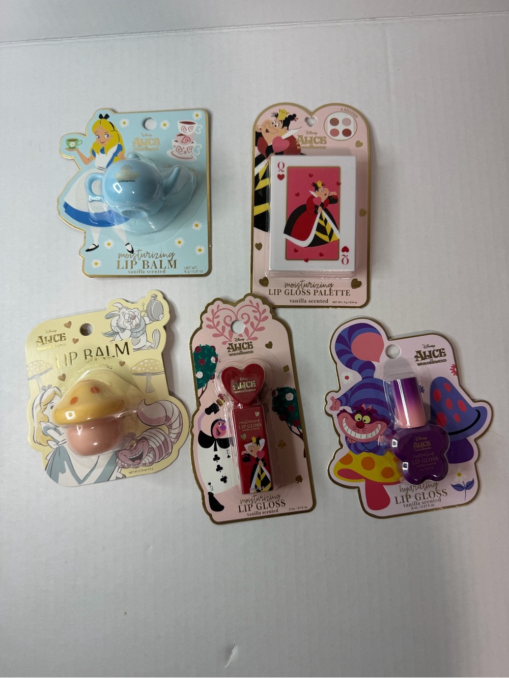 5 Alice in Wonderland Kids Lip Balm & Gloss Set - Blue, Pink, Purple, Yellow